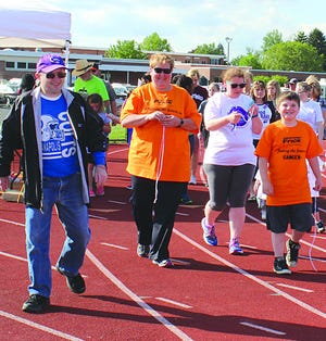 The Greencastle Relay for Life may have been cut a bit short with Saturday’s midday storms, but Friday found plenty of smiles around the Kaley Field track. The event featured 52 teams, both large and small, and aimed at raising upwards of $225,000 to help in the fight against cancer.