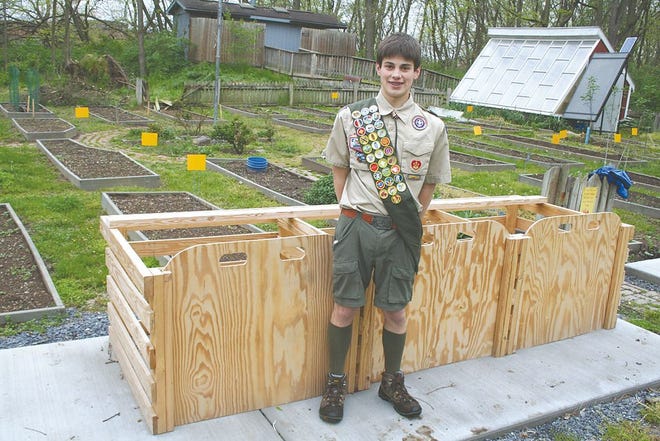 Nicholas Judge designed a compost system with doors that raise up for easy access to decaying natural materials. He set it up at Tayamentasachta for use by the the school district and for educational programs.