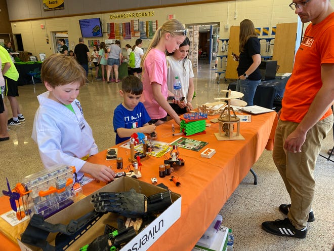 Kids checked out a JLG and Jerr-Dan Good2GiveBack exhibit at the Greencastle-Antrim School District’s Art & STEAM Expo on Wednesday, May 1.